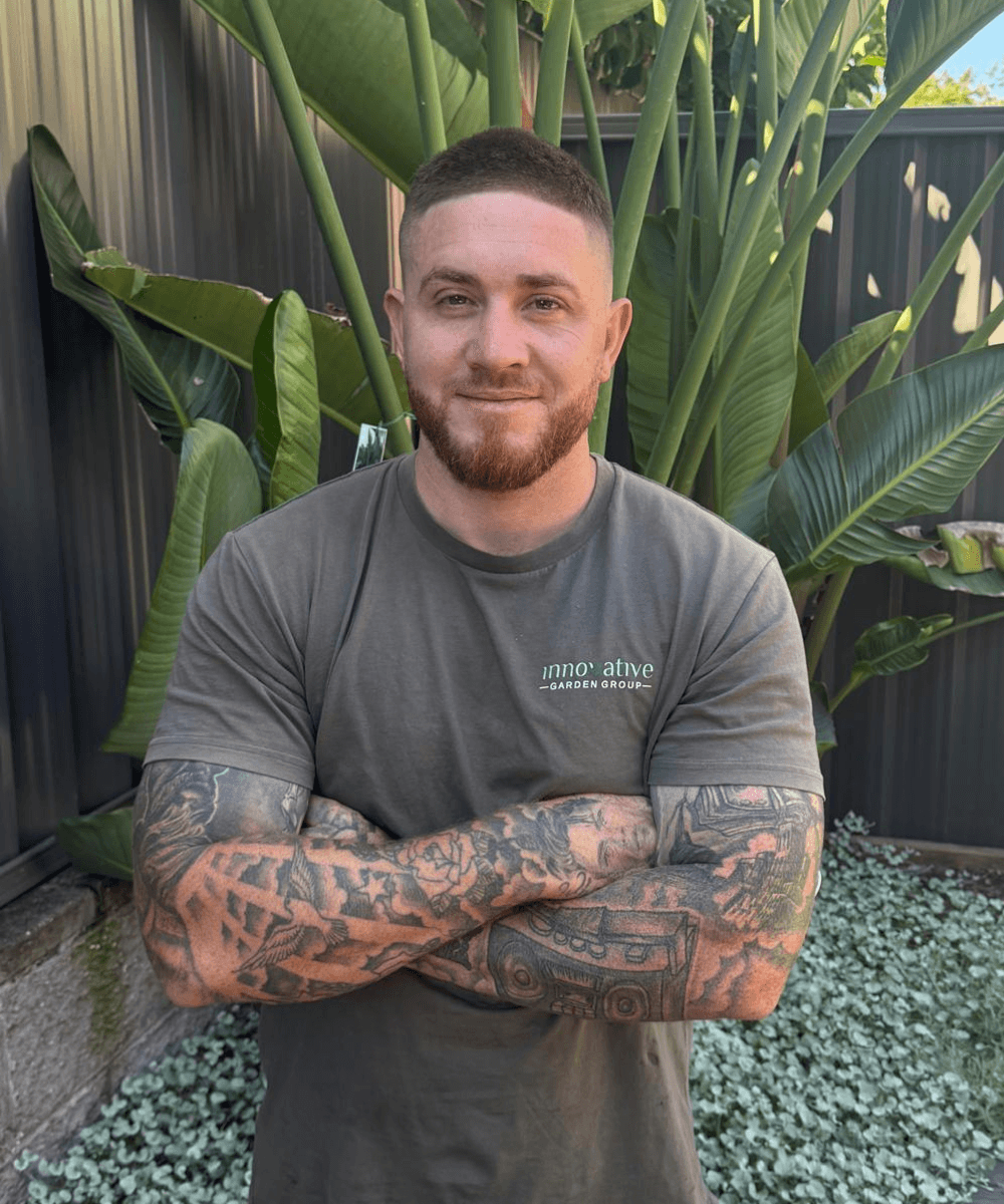 Garden maintenance professional on site