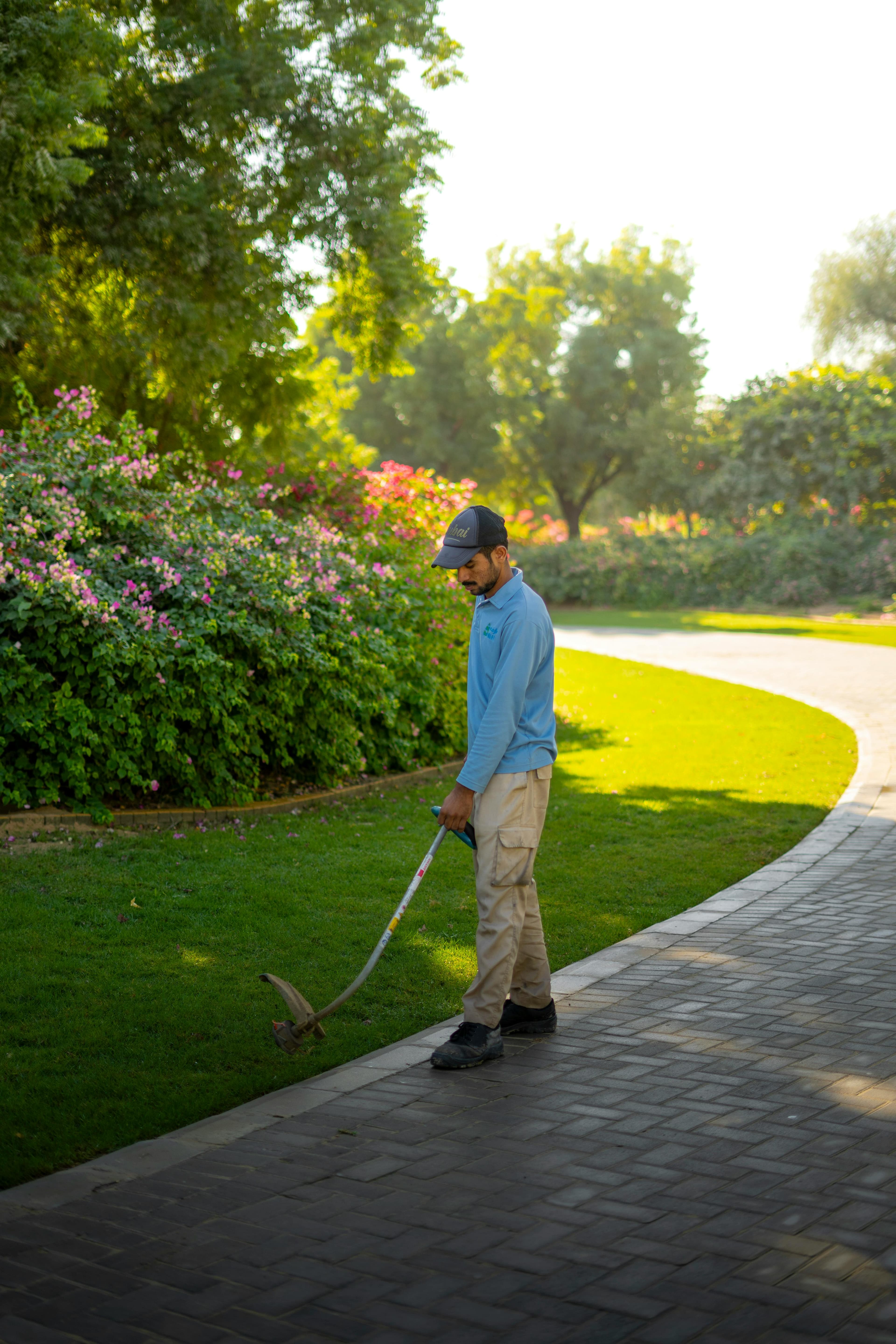 Landscaper working outdoors in a garden